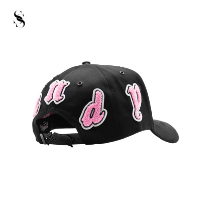 Sombrero Dandy Hats Fuck Off de Second Shot, sombrero negro con diseño llamativo y logotipo en la parte frontal.