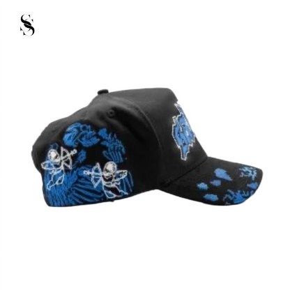 Gorro Dandy Hats x Junior H Ángel Azul de color azul con diseño de ángel, hecho por la marca Second Shot.