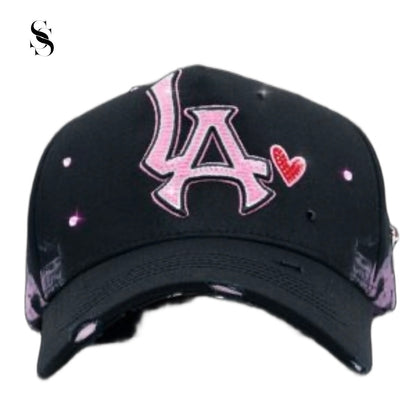 Sombreros 31 Hats LA Sweethearts de Second Shot en varios colores y estilos, con diseño de corazones para un look divertido y casual.