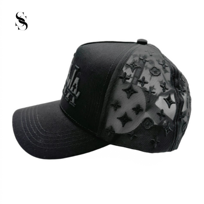 Gorra Rude Awakings LALALA en negro completo, marca Second Shot, con detalles en negro y diseño llamativo y moderno.