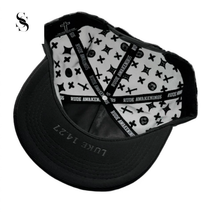 Gorra Rude Awakings LALALA en negro completo, marca Second Shot, con detalles en negro y diseño llamativo y moderno.