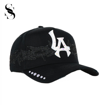 Sombrero 31 Hats LA Thorns de la marca Second Shot, con diseño deportivo y detalles en colores oscuros y blancos.