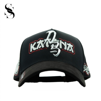 Sombrero El Dreamer Hats de Dan Sanchez, estilo fedora, con diseño único y detalles en tela gris y negro.