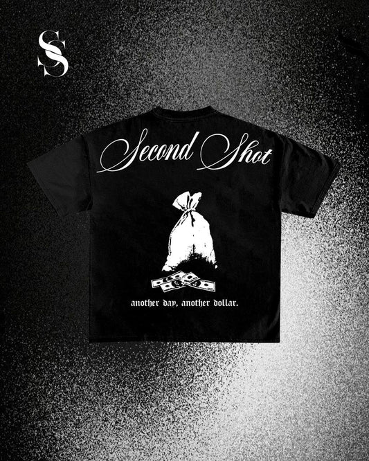 Camiseta negra de Second Shot con diseño gráfico de Another Dollar, estilo casual y cómodo para uso diario.