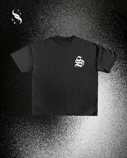 Camisa T-Shirt Cristo Pain negra de la marca Second Shot, con diseño impreso en el frente, manga corta y corte cómodo.