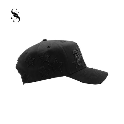 Sombrero Dandy Hats "I'm a Star" de la marca Second Shot, con diseño elegante y estampado brillante sobre fondo oscuro.